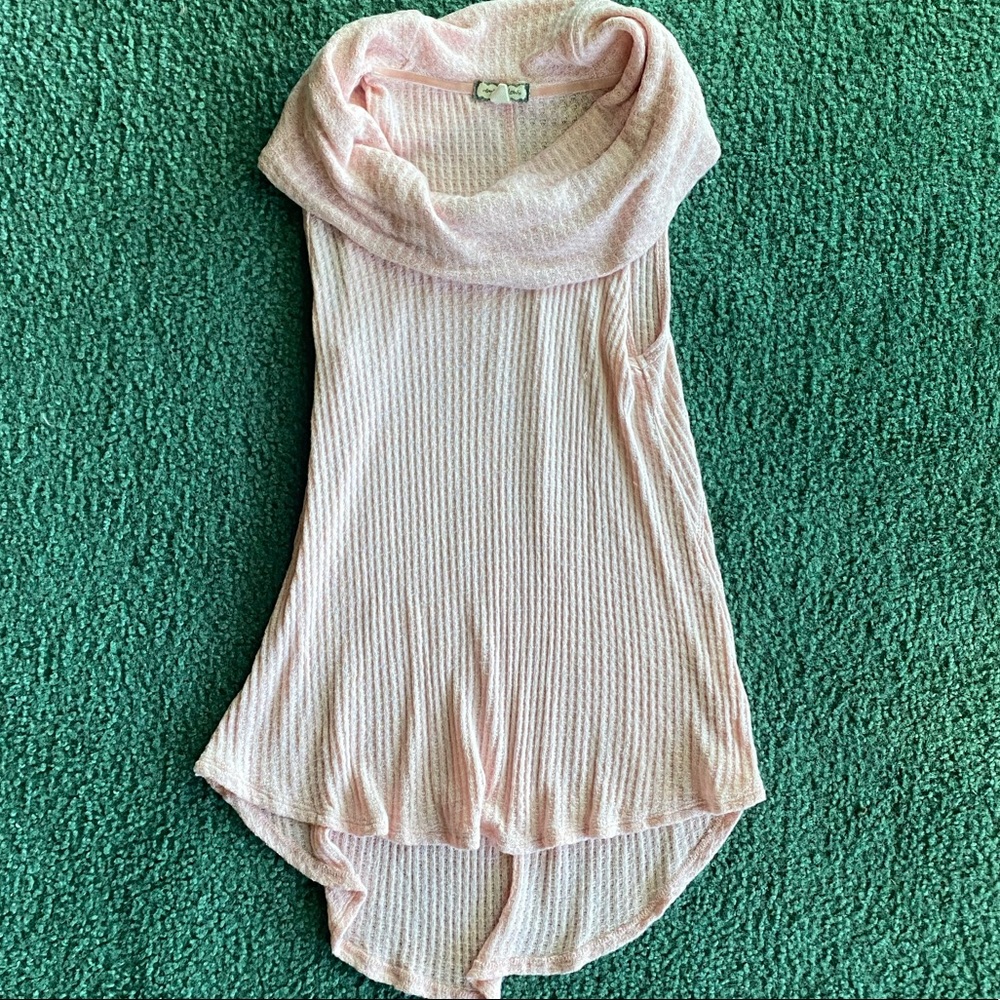 Pretty light pink sleeveless blouse